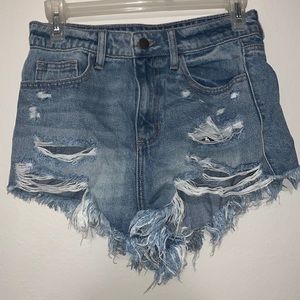 Medium blue wash distressed denim shorts